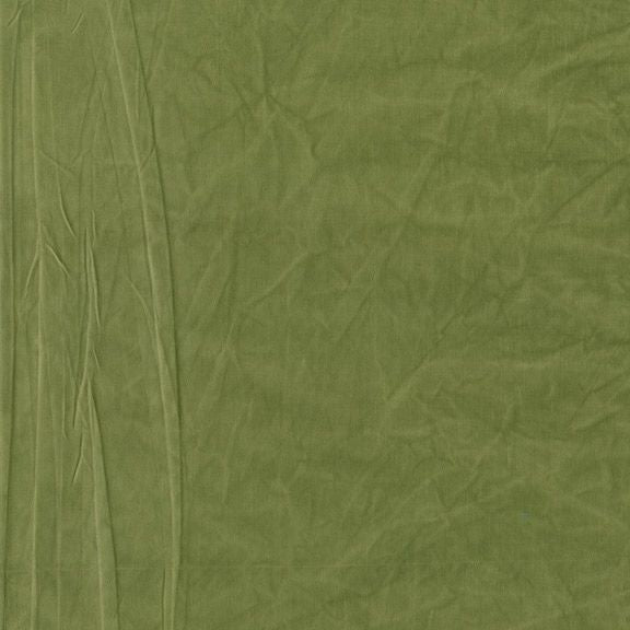 Close-up of green fabric with visible texture