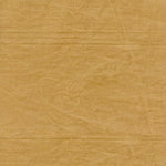Close-up of brown paper with textured surface