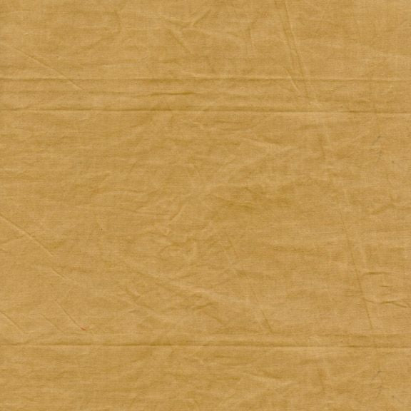 Close-up of brown paper with textured surface