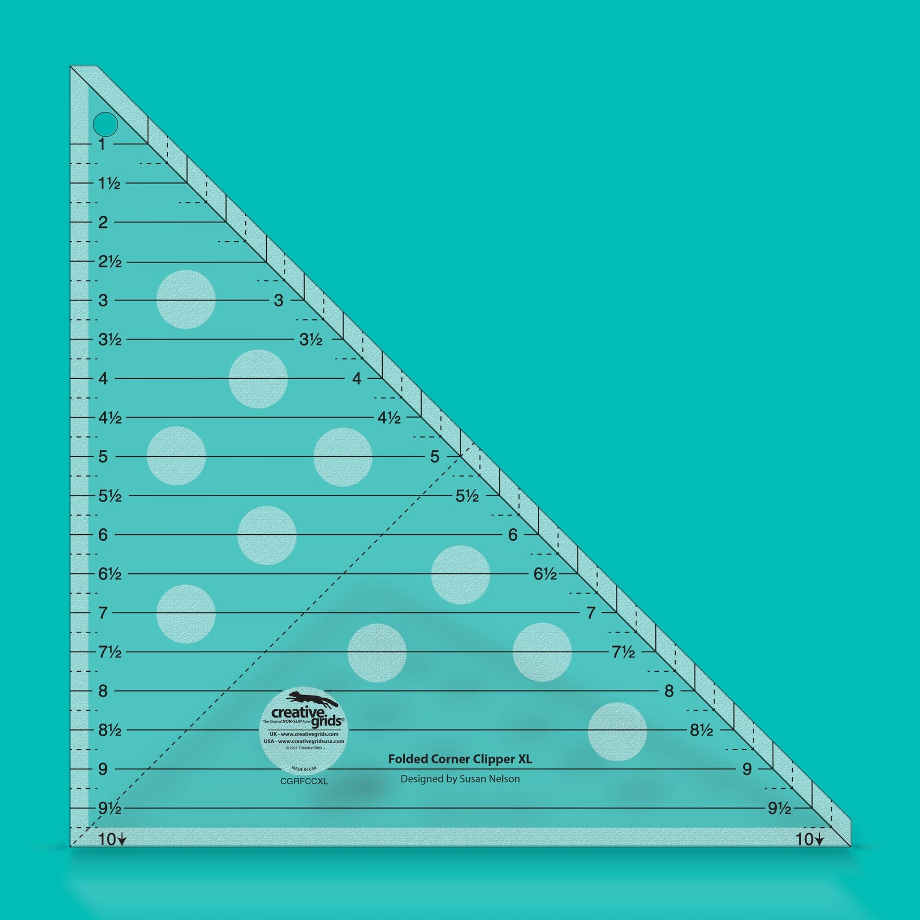 Clear triangular ruler with measurement markings on a teal background