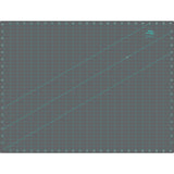 Grid-patterned cutting mat with measurements on a gray background