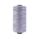 Spool of Fruitti Lavender FT4-19 12wt variegated Egyptian cotton thread featuring soft lavender and light purple tones with gentle variegation.