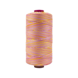 Spool of Fruitti Pansy FT4-05 12wt variegated Egyptian cotton thread featuring soft purple and lavender tones with subtle variegation.