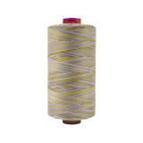 Spool of Fruitti Spring FT4-14 12wt variegated Egyptian cotton thread featuring fresh spring green and soft light tones with gentle color variation.