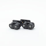 Two black camera mount brackets on a white background