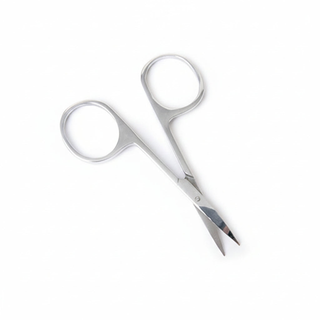 Pair of silver scissors on a white background