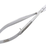 Hairdressing scissors with a comb on a white background