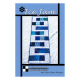 A quilt pattern cover for 'Ice Jam' by Linda Ayers, featuring a blue and white geometric patchwork quilt laid out on white snow. The cover has a light blue border with black lines and text reading 'Ice Jam' and 'Linda Ayers Often Quilt Designs For Villa Rosa Designs'.