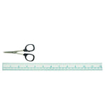 Scissors and ruler on a white background