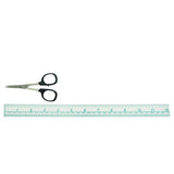 Scissors and ruler on a white background