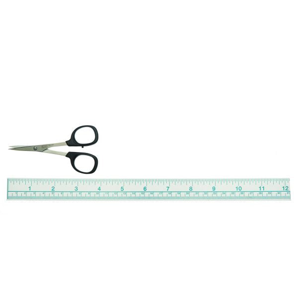 Scissors and ruler on a white background