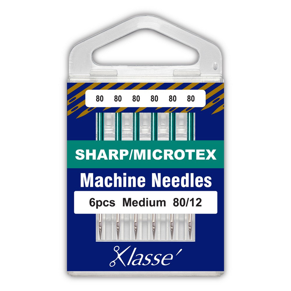 Klasse' machine needles packaging with six needles inside on a blue background