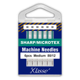 Klasse' machine needles packaging with six needles inside on a blue background