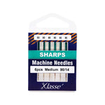 Pack of Sharps machine needles by Lasse on a white background