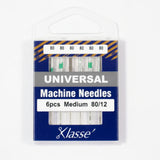 Pack of Klasse machine needles with blue packaging on a white background