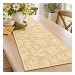 Quilted table runner made with Ladybug Whimsy  Cream fabric, featuring delicate cream floral silhouettes and golden detailing by Gingiber for Moda.