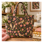 Handmade quilted sewing tote featuring Ladybug Whimsy Garden Birds Black fabric with golden songbirds, pink blossoms and green leaves by Gingiber for Moda.