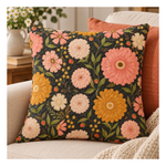 Quilted accent pillow featuring Ladybug Whimsy Zinnias Black fabric with large coral, pink, cream and golden flowers by Gingiber for Moda.