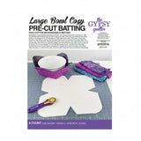 Pre-cut batting for large bowl cozies with a cutting mat and rotary cutter on a white background.