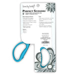 Blue scissors with packaging featuring text and floral design on a white background