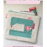 Piecemaker pouch with heart design on a white background, featuring Sew Lux Fabric branding.