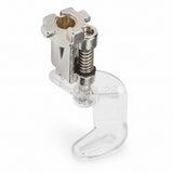 Metal clip with a clear plastic base on a white background