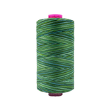 Spool of Tutti Evergreen TU1-31 50wt variegated Egyptian cotton thread featuring deep evergreen green tones with subtle natural variation.