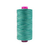 Spool of Tutti Peacock TU1-22 50wt variegated Egyptian cotton thread featuring vibrant teal, green, and blue tones with rich ocean-inspired variation.